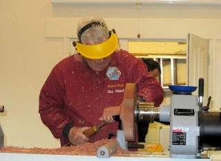 Chris Withall working on another really hard lump of wood